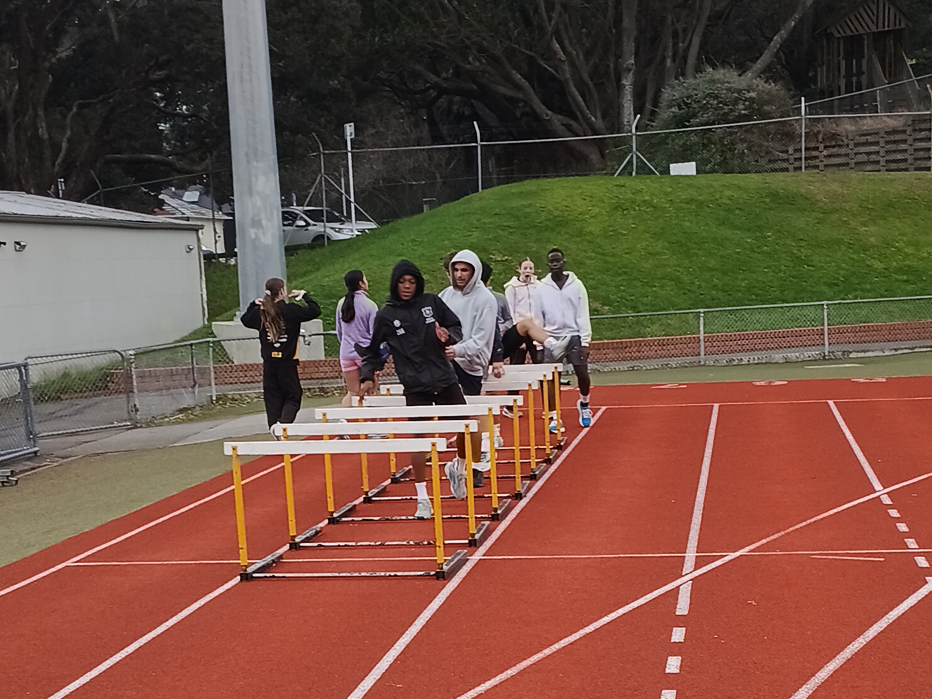 Connor Bowen hurdle mobility drill, track session